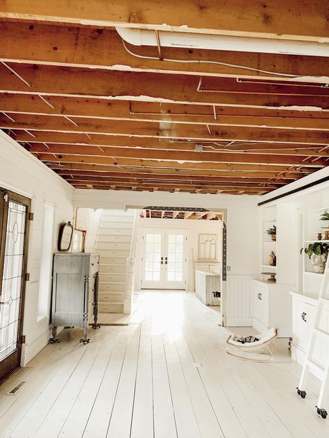 Why we tore out our ceilings 3 Exposing Ceiling Beams, Wood Exposed Ceiling, Painted Joist Ceiling, Open Wood Ceiling, Ceiling Support Beam Ideas, Low Ceiling Beam Ideas, Exposed Ceiling Rafters, Open Rafters Ceiling Exposed Beams, Exposing Ceiling Joists