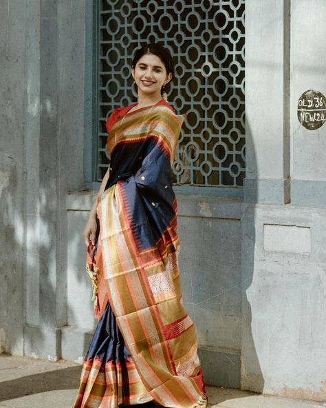 மல்லி A casual day in 80s Tamil culture with Pattu Pett Kanjivaram silk sarees would encapsulate a harmonious blend of tradition, comfort, and effortless elegance, reflecting the timeless beauty of South Indian silk attire. This Navy Blue Kanchipuram silk saree has small buttas all over the body and an intricately woven multicolored silk border. [Silk, Pattu Pet, Tulsi Weaves, silk saree, saree, silk, handloom saree, handloom, Traditional, Vintage, No Zari, Kanchipuram Silk Saree, kanjeev... Vintage Pattu Saree, Tamil Culture, Saree Silk, Saree Handloom, Pattu Saree, Kanchipuram Silk Saree, Effortless Elegance, Handloom Saree, Silk Saree