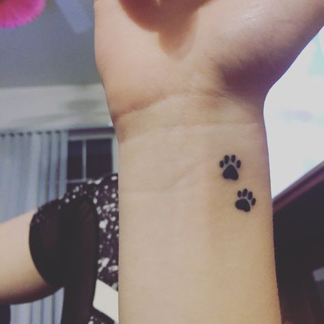 Paw print tattoo Hand Print Tattoos, Cat Paw Print Tattoo, Cat Paw Tattoos, Animal Tattoos For Women, Kitty Tattoos, Pawprint Tattoo, Dog Paw Tattoo, Cool Wrist Tattoos, Paw Tattoo