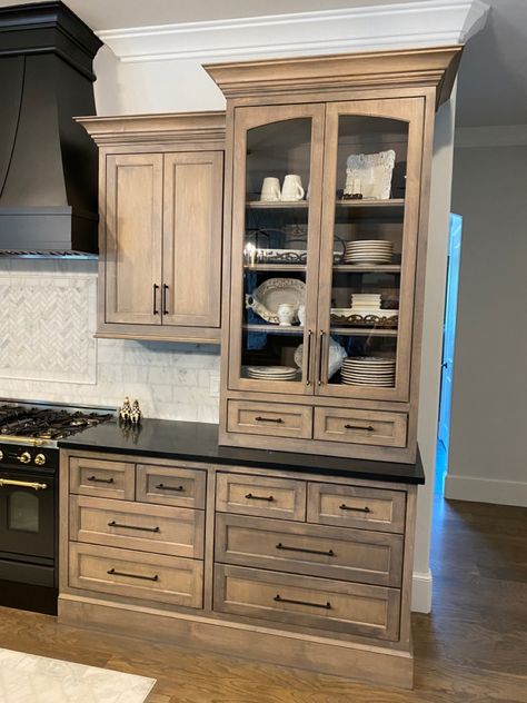 Paint And Stain Kitchen Cabinets, Medium Brown Kitchen Cabinets Ideas, Fallow Cabinets, Upper Cabinet Trim, Driftwood Cabinets, Rustic Alder Kitchen Cabinets, Kitchen Cupboard Ideas, Knotty Alder Kitchen Cabinets, Kitchen Wood Cabinets