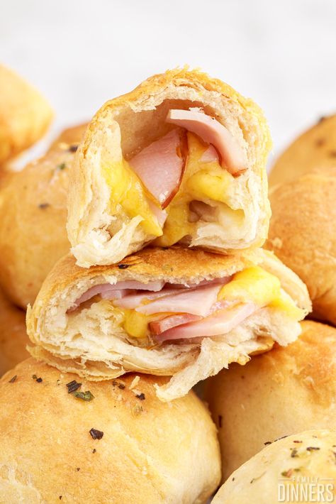 Make air fryer ham and cheese sandwich bombs for a fun appetizer or lunch idea. These ham and cheese slider bombs are great for game day snacks, Super Bowl recipe, birthday party food and more. Ham and cheese biscuit bomb are easy and quick to make. Ham And Cheese Bites, Ham And Cheese Hot Pockets, Grand Biscuit Recipes, Air Fryer Ham, Sandwich Bites, Flakey Biscuits, Biscuit Dough Recipes, Hot Ham And Cheese, Cheese Biscuit