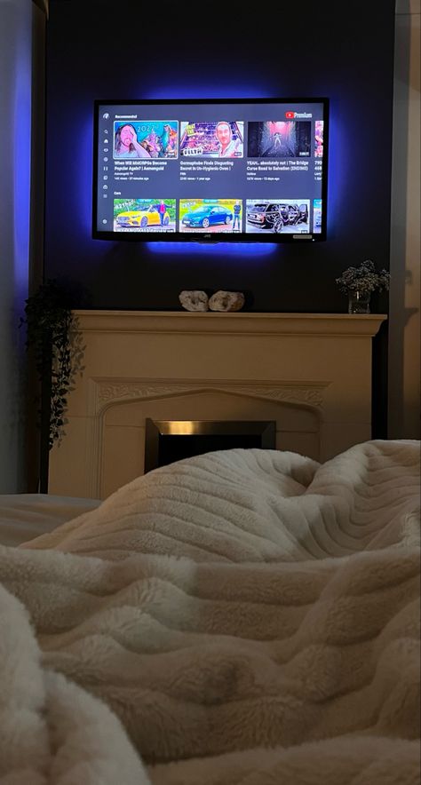 Cosy, bedroom, cosy room, bedroom aesthetic, crystal, fireplace decor, fireplace, decoration, blanket, led tv Tv In Bed Aesthetic, Fairy Lights Tv Room, Under Tv Bedroom Ideas, Tv In Bedroom Aesthetic, Tv Aesthetic Watching, Cozy Watching Tv Aesthetic, Watching Tv In Bed Aesthetic, Tv Snap Night, Watching Tv Aesthetic