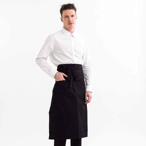 Expertly crafted in Chicago from a durable 7.5 oz twill, this is a workhorse of a waist apron. Featuring dual hand pockets to store all of your serving needs, this apron will show up to work day in and day out. Features: Two Hand Pockets Material: 7.5oz Polyester/Cotton Twill, Black Cotton Webbing Ties Fit: 31" Length Handmade in Chicago, USA Bistro Apron, Noodle Bar, Custom Uniform, Restaurant Ideas, Chicago Usa, Waist Apron, For Life, Cotton Twill, Black Cotton