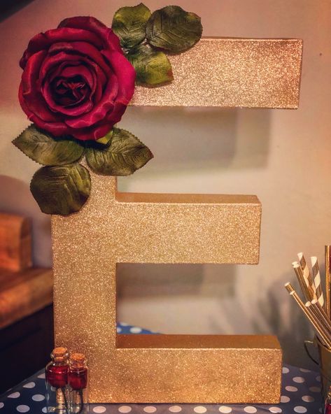 Beauty and the beast party decor. Letter, gold spray paint, and decorative rose all from hobby lobby Belle Birthday Party, Beauty And Beast Birthday, Deco Disney, Beauty And Beast Wedding, Beauty And The Beast Theme, Belle Birthday, Quince Decorations, Beauty And The Beast Party, Tema Disney