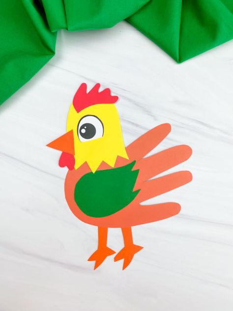 Need a cute handprint craft? This easy rooster craft is fun and comes with a free printable template. Rooster Craft, Farm Animal Crafts, Farm Craft, Pig Crafts, Headband Crafts, Animal Art Projects, Paper Bag Crafts, Construction Paper Crafts, Mouse Crafts