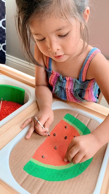 Wendy | Pediatrician on Instagram: "🍉 WATERMELON FINE MOTOR BOARD - ❤️ and SAVE if you’re not ready for summer to end! Here’s a fun way to work on hand-eye coordination and finger strength. 🍉 To make, I painted a watermelon onto cardboard and poked holes. Q-tips were dipped into water with black food coloring (liquid watercolor works well for this too). Once dry, I buried the “seeds” in dyed rice which added an additional sensory component 🌈 To color rice, mix food coloring, rice, and 1 tablespoon of vinegar (helps spread and set the color) then set out to dry ✨ Follow @ohhappyplayday for more play-based learning ✨ . . . . #toddlers #kidactivities #diymom #simpleplayideas #educational #teachersofinstagram #earlychildhoodeducation #prek #playideas #learningthroughplay #recycleandplay #p Coloring Rice, Fine Motor Board, Dyed Rice, Color Rice, Black Food Coloring, Finger Strength, Rice Mix, Colored Rice, Liquid Watercolor