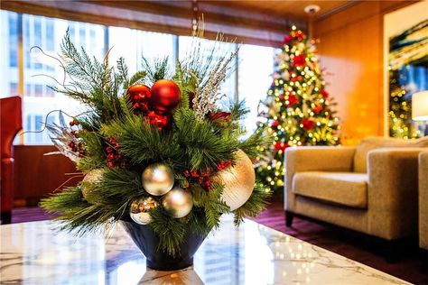 50 Best Office Christmas Decorating Ideas | News | Open Sourced Workplace Christmas Party Centerpieces, Tea Light Snowman, Hanging Centerpiece, Lobby Decor, Company Christmas Party, Office Lobby, Colonial Christmas, Modern Christmas Decor, Business Decor