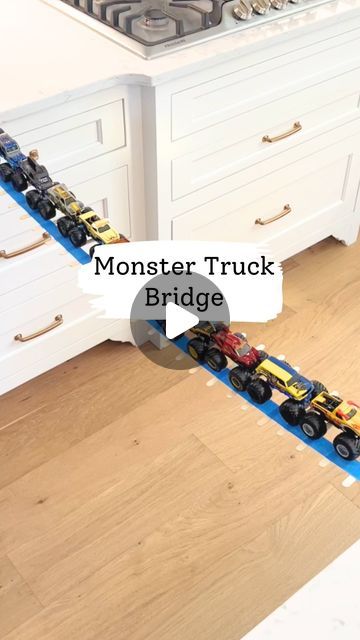 Melissa Kate on Instagram: "Got monster trucks? Try this truck bridge! Follow @bymelissakate for more truck and car activities!! ✅🚗  🚗 Connect two rows of painters tape between two level surfaces, we like to use the kitchen counters 🚗 Stick some craft popsicle sticks underneath and you have a bridge!  🚗 Drive and balance the monster trucks across the "lava"  Check out my Amazon storefront (link in bio) for all my favorite activity essentials.   #kidsactivities #toddlermom #kidsactivityideas #kidsactivity #boymom #monsterjam #toddleractivity #toddleractivityideas #simpleactivities #toddlerplay #boymom #momsofinstagram #momtips #momtricks #toddler #indooractivities #toddlersofinstagram #toddlerfun #kidscraftideas #toddlercrafts #momhack #playbasedlearning #preschoolactivities #boymama #p Monster Truck Race Track Diy, Monster Truck Play Ideas, Monster Truck Play, Car Activities For Toddlers, Truck Activities, Craft Popsicle Sticks, Toddler Car Activities, Car Tracks For Kids, Monster Truck Cars