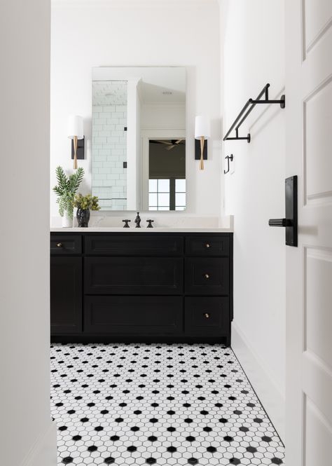 Lucas Family Farmhouse - Farmhouse - Bathroom - Dallas - by BGI Design | Houzz White Walls Black Cabinets Bathroom, Powder Room Black And White Floor, Bathroom With Black And White Tile Floor, Black And White Bathroom Floor Tile, Black Cabinet Bathroom, Black And White Hexagon Tile Bathroom, Black Bathroom Cabinets, Black And White Bathroom Tile, White Hexagon Tile Bathroom