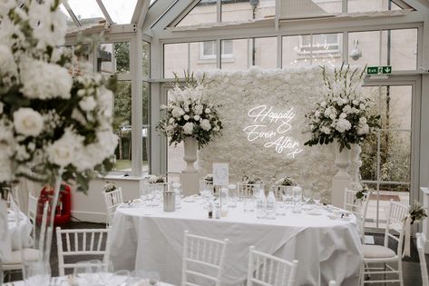 White Flower Wall With Neon Sign, Neon Sign Flower Wall Wedding, Neon Sign On Sweetheart Table, Wedding Neon Sign Behind Sweetheart Table, Sweetheart Table Wedding With Neon Sign, Head Table Wedding Backdrop, Luxury Event Decor, Rose Gold Wedding Decor, Corporate Events Decoration