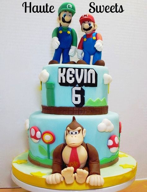 Super Mario Bros. And Donkey Kong Birthday Cake - 5&7 inch chocolate cake with strawberry buttercream. The figures are made of the mix of fondant and tylose powder Sweets Doodles, Donkey Kong Cake, Nintendo Cake, Mario Birthday Cake, Mario Bros Cake, Super Mario Cake, Movie Cakes, Cake With Strawberry, Mario Cake