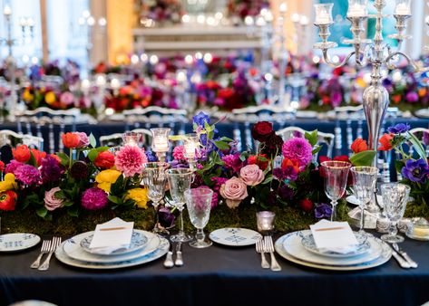 Midnight blue tablecloths set off the bright orange, red, yellow, purple and pinks florals. #fete_event_planning #feteinfrance #weddingparis #luxurydestinationwedding #parisweddingplanner Black Tablecloth Wedding, Black Wedding Table Setting, Event Installation, Bold Wedding Colors, Black Wedding Table, Bright Centerpieces, Emerald Green Wedding Theme, Dark Romantic Wedding, Long Table Wedding