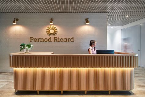 Unispace | Project | Pernod Ricard Brown Reception Desk, Store Fixtures Design, Bar Counter Design, Display Retail, Pernod Ricard, Staircase Railing Design, Hotel Lobby Design, Office Table Design, Retail Store Display