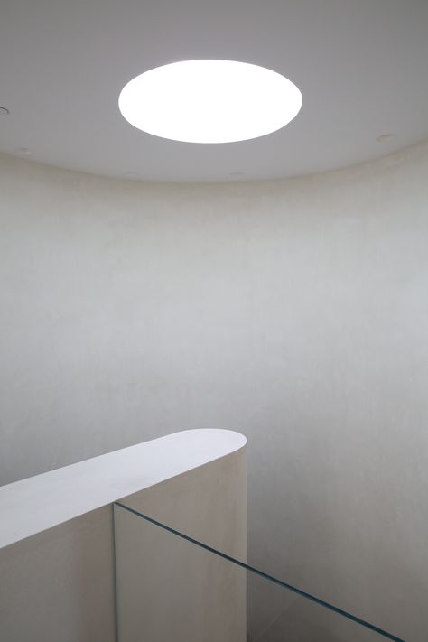 Hawk & Co's Spanish Minimal project showcases a plaster finished barrel stair with round skylight above. Circle Skylight, Round Skylight, Circle Stairs, Spanish Modern, Barrel, Stairs