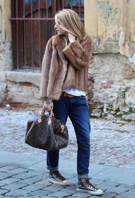 Shop this look on Lookastic:  http://lookastic.com/women/looks/sunglasses-watch-jacket-crew-neck-t-shirt-belt-bracelet-tote-bag-boyfriend-jeans-high-top-sneakers/5427  — Grey Sunglasses  — Gold Watch  — Brown Fur Jacket  — White Crew-neck T-shirt  — Brown Suede Belt  — Gold Bracelet  — Dark Brown Print Leather Tote Bag  — Navy Boyfriend Jeans  — Charcoal Leather High Top Sneakers Converse Street Style, Short Faux Fur Coat, Fur Coat Outfit, Stylish Winter Coats, High Wasted Jeans, Chique Outfit, Winter Fur Coats, Beige Outfit, Jean Trends