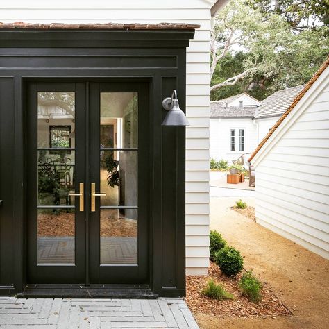 Merritt Amanti Palminteri (@maparchitect) on Instagram: “My favorite door (Carmel New Cottage) #blackpaint #whitesiding #hiddencourtyard” Garage To Living Space, Elegant Doors, Garage Door Design, Cottage Exterior, French Cottage, Black Doors, Back Patio, Painted Doors, Patio Doors