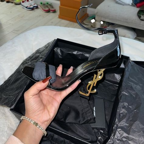 BLACK AND GOLD OPYUM YSL HEELS Ysl Heels Outfit, Khaleeji Aesthetic, Ysl Heels, Yves Saint Laurent Shoes, Heels Outfits, Girls Heels, Saint Laurent Shoes, Gold Heels, Party Outfits