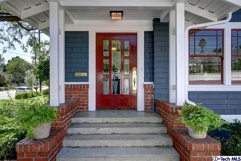 Red front door with blue siding on Craftsman in Pasadena | hookedonhouses.net Red Door House, California Craftsman, Paint Colors For House, Colors For House, Blue Siding, Red Front Door, House Trim, Red Brick House, Exterior Paint Colors For House