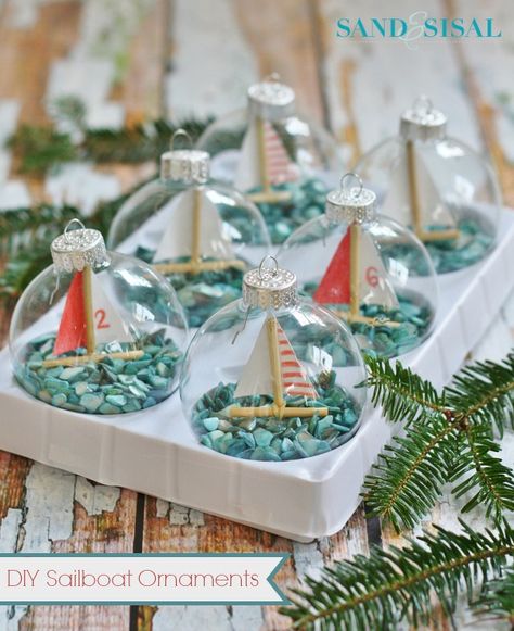 DIY Sailboat Ornaments. #coastal http://www.aftershocksinteriordecorating.com/interior-decorating-and-design-blog Diy Sailboat, Nautical Christmas Tree, Beach Christmas Decorations, Coastal Christmas Tree, Coastal Christmas Decor, Winter Ornaments, Nautical Christmas, Beachy Christmas, Diy Winter