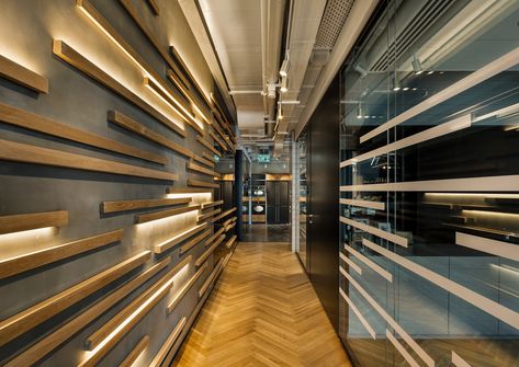 Cool wall. Also cool parallelism in the horizontal lines across wall and glass ~~~ Danyel Biotech Offices - Rehovot - 3 Lobby Designs, Office Wall Graphics, Architects Desk, Elevator Lobby, Lobby Decor, Corridor Design, Commercial And Office Architecture, Office Snapshots, Interior Wall Design