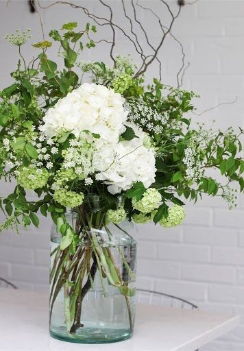 Flowers Hydrangea Arrangement, White And Green Arrangements, Flower Arrangement Hydrangeas, How To Do Floral Arrangements, Home Floral Decor, White Green Flower Arrangements, White Hydrangea Arrangements, Hydrangea Table Arrangements, Viburnum Arrangement