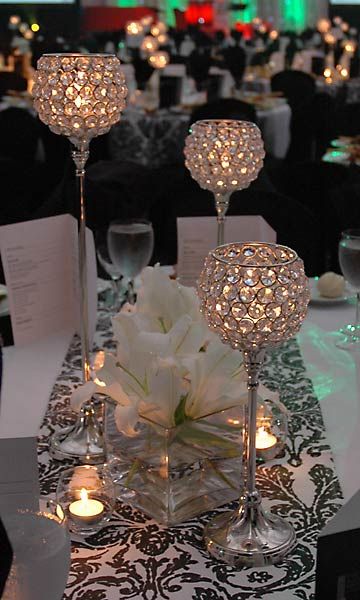 Crystal candleholders and black and white runner Centerpieces Wedding Crystal, Crystal Candle Holders Wedding, Tall Crystal Centerpieces, Crystal Candle Holders Centerpieces, Crystal Candelabra Centerpiece, Crystal Centerpieces Wedding, Crystal Candelabra Wedding, Crystal Candelabra, White Runners