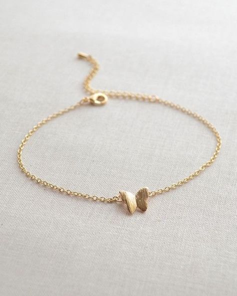 Butterfly Bracelet by Olive Yew. This butterfly bracelet is so dainty and feminine. It is adjustable from 7 - 9 inches, so it will fit any size wrist. Grunge Necklace, Accessoires Iphone, Butterfly Bracelet, Fancy Jewellery, Gold Earrings Designs, Fancy Jewelry, Hand Jewelry, Girly Jewelry, Stylish Jewelry