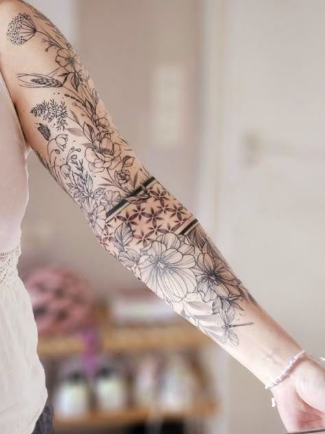 Wrist Tattoos For Women Sleeve, Mountain Botanical Tattoo, Wildflowers Tattoo Sleeve, Floral And Geometric Tattoo Sleeve, Geometric Tattoo Sleeve Designs Women, Geometric Flower Tattoo Sleeve, Life Quote Tattoos For Women, Fine Line Sleeve Tattoo, Whimsical Tattoo Sleeve