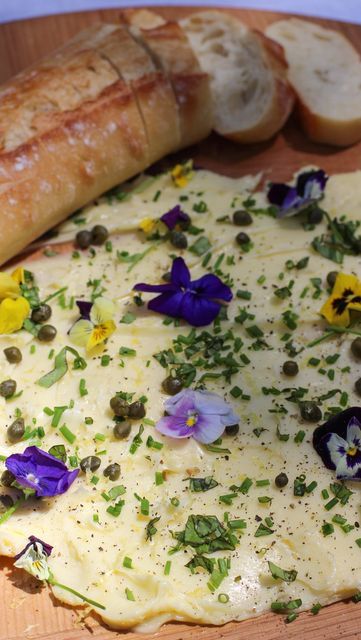 Alston & Leigh on Instagram: "WARM BREAD with LEMON CAPER BUTTER + HERBS💫Honestly, what is better than bread and butter?? Really good warm salted butter with capers, herbs, lemon zest-sprinkled with edible flowers! We love this idea from Joshua McFadden @jj__mc (Six Seasons). His directions are vague and simple. Spread really good salted butter on a board and top with anything you like! Hands down our favorite “dish” on our Summer Solstice menu. And takes all of 5 minutes to prepare. Our vari Caper Butter, Butter Boards, Butter Board, Six Seasons, Sunflower Butter, Cracked Pepper, Bread And Butter, Spring Recipes, Summer Solstice