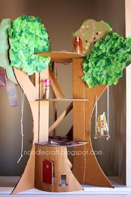 Love this cardboard treehouse toy. Perhaps I could do a similar thing to make a rocket ship too! Diy Cardboard Tree House, Cardboard Tree House, Cardboard Treehouse, Cardboard Tree, Cardboard Crafts Kids, Plastic Tree, Cardboard Box Crafts, Cardboard Toys, Church Nursery