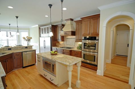 Honey Wood Floors, Updating Oak Cabinets, Oak Floor Kitchen, Pendant Lights For Kitchen, Honey Oak Cabinets, Lights For Kitchen, Acacia Wood Table, House Remodeling, Oak Kitchen Cabinets