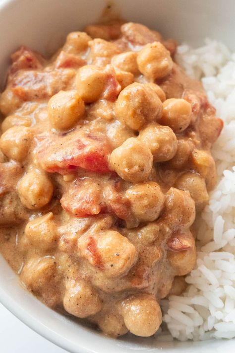 Easy Chickpea Curry made on the stovetop in 25 minutes. This NOT SPICY curry is made with cans of chickpeas, diced tomatoes and coconut milk. Mom, Dad, kid and toddler approved! Coconut Chickpea Curry, Coconut Chickpea, Easy Chickpea Curry, Chickpea Coconut Curry, Spicy Curry, Chickpea Curry, Diced Tomatoes, Vegetarian Food, Curry Powder