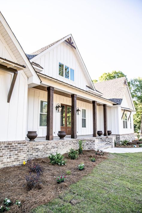 White Board And Batten Exterior With Wood Accents, Back Porch Siding Ideas, Exterior Brick Accents, Hardi Siding Exterior, Modern Farmhouse Exterior Colors White, Belgian Farmhouse Style, Front Deck Ideas Entrance Porch Designs Farmhouse, Contemporary Farmhouse Exterior Design, White House With Brick Accents Exterior