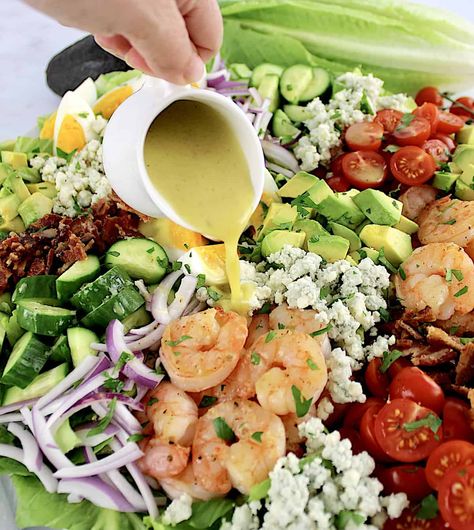 This nutritious Shrimp Cobb Salad is packed with perfectly sautéed shrimp, crispy bacon, and creamy avocado, all tossed in a tangy lemon vinaigrette. It's a vibrant, flavorful dish that's bursting with delicious classic Cobb flavors. Summer Shrimp Salad Recipes, Shrimp Green Salad, Shrimp Cobb Salad Recipes, Green Salad With Shrimp, Salad With Shrimp Recipes, Shrimp Cobb Salad, Salad With Shrimp, Classic Cobb Salad, Slow Cooker Appetizers