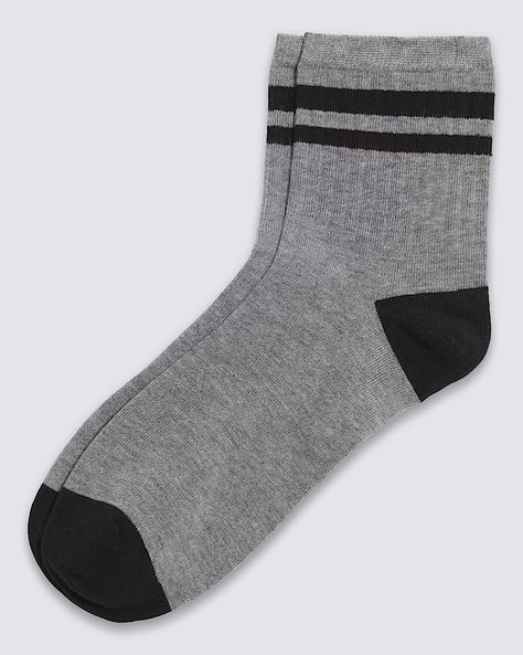 The Bregman Half Crew Sock is a thin rib-knit sock in a half crew height, featuring jacquard stripes with a Vans logo on the sole.