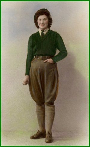 Women joining the Women's Land Army (WLA) during WW II were issued a simple uniform consisting of 2 green sweaters, 2 pairs of brown breeches (either twill or corduroy), 1 pair of brown overalls, 6 pairs of brown long woolen socks, 3 shirts, a green tie, a pair of shoes, a pair of ankle boots, a pair of tall boots, 2 overcoats, 1 raincoat,  and a brown floppy hat or beret. It was a civilian English/Wales organization that hired women to do farm functions since many men were at war. Brown Overalls, Women's Land Army, Green Sweaters, Woolen Socks, Land Girls, 1910s Fashion, Hat Organization, British Women, Army Girl