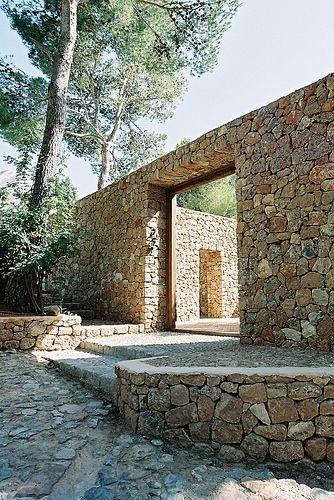 terravita - eivissa Old Cabin, Stone Architecture, Rock Wall, Stone Walls, Mediterranean Garden, Mediterranean Homes, Architecture Exterior, Stone Houses, Brick And Stone