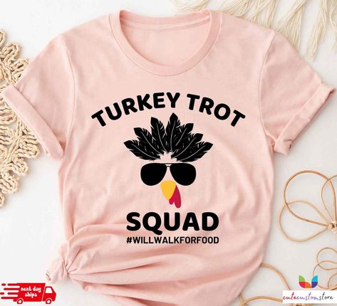 "Turkey Trot Shirt, Thanksgiving Turkey Shirts, Thanksgiving Shirts For Family 2022, Thanksgiving Gifts, Family Matching Tee, Fall Shirts Sizes/Shirt Types Available: Crew Neck (S, M, L, XL, 2XL) V-Neck (S, M, L, XL, 2XL) Youth (S, M, L, XL) Toddler (2T,3T,4T,5T) Baby Onepiece (3-6M, 6-12M, 12-18M, 18-24M) Available in all sizes. All kids sizes are unisex crewneck and true to size on average. Crewnecks match in color. There might be a slight variance in shades with v-necks, YOuth and Toddler. Al Shirt Types, Turkey Trot, Turkey Shirts, Matching Tees, All Kids, Custom Letters, Thanksgiving Shirts, Thanksgiving Turkey, Thanksgiving Gifts