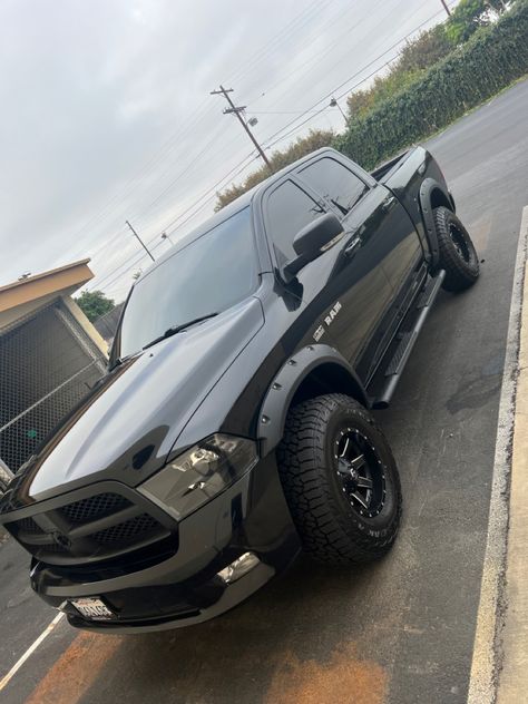 All black 2009 Ram 1500. 4x4 17x10 inch wheels 35x12.50x17 Falcon A/T tires. 3 inch level. Fuel Maverick wheels. Fender  flares. Tinted front windshield. Blacked headlights. Plastic dip grill. 2013 Dodge Ram 1500, Black Dodge Ram 1500, Blacked Out Ram 1500, Black Ram Truck, Ram 1500 Mods, Black Ram 1500, Dodge Ram Rt, Doge Ram, Ram 2014