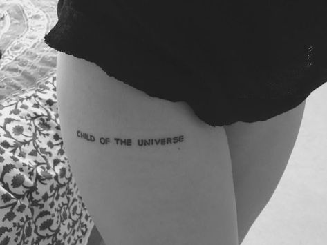 Thigh Text Tattoos For Women, Above Knee Script Tattoo, Thigh Tattoos Writing, Thigh Writing Tattoo, Name On Thigh, No Surprises Tattoo, Child Of The Universe Tattoo, Tattoo Thigh Women, Above The Knee Tattoo Quote