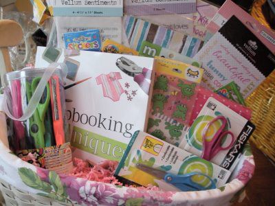 Scrapbooking gift basket - include scrapbook paper, stickers, ribbon, scissors, glue sticks and other embellishments. Hit the Dollar Store and clearance racks! Scrapbook Gift Basket, Chinese Auction, Tricky Tray, Theme Baskets, Auction Basket, Raffle Basket, Auction Baskets, Fall Candy, Gift Baskets For Women