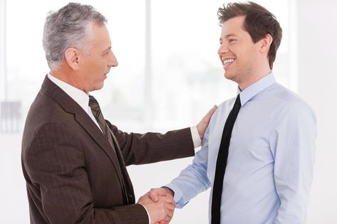 Business partners. Two cheerful business men shaking hands and looking at each other Men Shaking Hands, Know Your Future, Looking At Each Other, Shaking Hands, Job Interviews, Professional Goals, Business Men, Personal Success, Business Partners