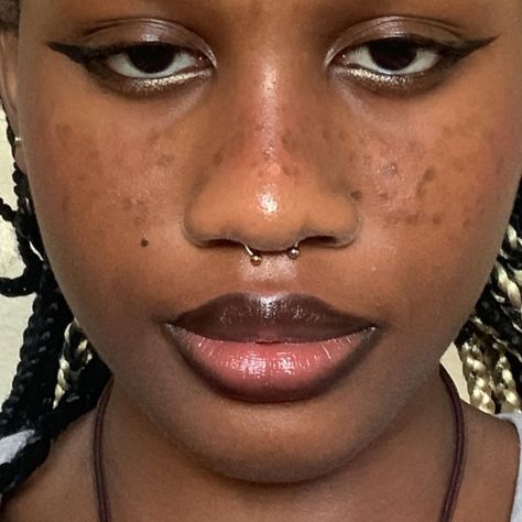 Black girl septum, black girl grunge makeup, grunge makeup, hippy makeup, black girl grunge, black girl hippy, ethereal black girl Gold Septum Black Woman, Septum Piercing On Wide Nose, Piercings On Big Noses, Black Septum Piercing Aesthetic, Septum On Big Nose, Gold Septum Piercing On Black Women, Septum Piercing On Big Nose, Septum Black Women, Septum Piercing Big Nose