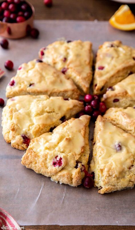 These Homemade Cranberry Orange Scones with fresh orange glaze is such a perfect Christmas breakfast recipe. Making cream scones from scratch is very simple, and these scones are so moist and flavorful thanks to the sour cream, heavy cream and orange juice. Cranberry Orange Scones Recipe, Sour Cream Scones, Cream Scones Recipe, Orange Scones Recipe, Cranberry Orange Scones, Cranberry Scones, Scones Recipe Easy, Orange Scones, Lemon Scones