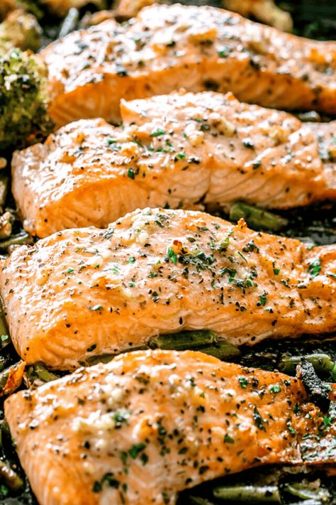 This simple salmon recipe is brushed with a garlic butter sauce and baked with your favorite veggies for a quick sheet pan meal! Simple Salmon Recipe, Pan Salmon, Easy Salmon Recipes, Salmon Dinner, Garlic Butter Sauce, Baked Salmon Recipes, Sheet Pan Dinners, Sheet Pan Recipes, Butter Sauce