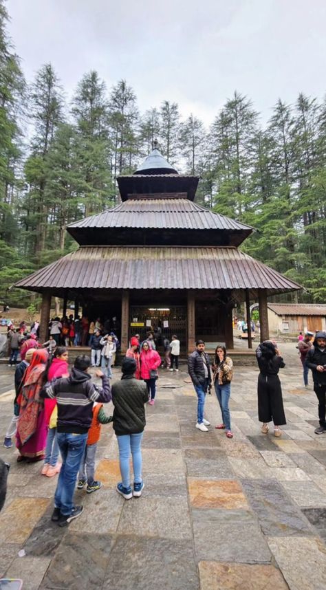 Hidimba Devi Temple, locally known as Dhungari Temple, also known variously as the Hadimba Temple, is located in Manāli, a hill station in the State of Himāchal Pradesh in north India. It is an ancient cave temple dedicated to Hidimbi Devi, wife of Bhima, a figure in the Indian epic Mahābhārata. The temple is surrounded by a cedar forest called Dhungiri Van Vihar at the foot of the Himālayas. Hidimba Temple Manali, Hadimba Temple Manali, Cave Temple, 2025 Board, Devi Temple, Cedar Forest, Holiday Travel Destinations, Ganpati Decoration, North India