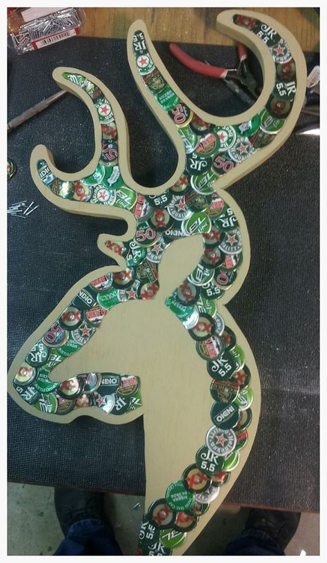 browning deer head bottle cap art Check us out on Facebook/madcapcreations! Bottle Cap Rooster, Bottle Cap Fish Art, Beer Cap Crafts Diy, Bottle Cap Deer Head, Bottle Cap Fish, Beer Bottle Cap Art Red Truck, Beer Cap Projects, Beer Cap Table, Beer Bottle Art