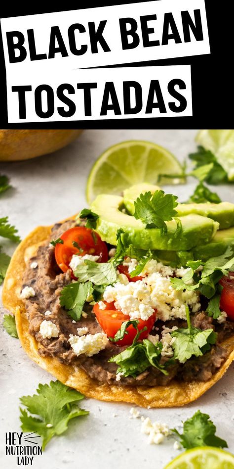 These quick and easy Black Bean Tostadas are made with oven-crisped tortillas, refried black beans, and all of your favourite toppings. Simple to make and endlessly customizable, these vegetarian tostadas are a family favorite. Black Bean Tostada, Vegetarian Tostadas, Bean Tostada, Black Bean Tostadas, Bean Tostadas, Refried Black Beans, Vegetarian Mexican Recipes, Tostada Recipes, Homemade Refried Beans