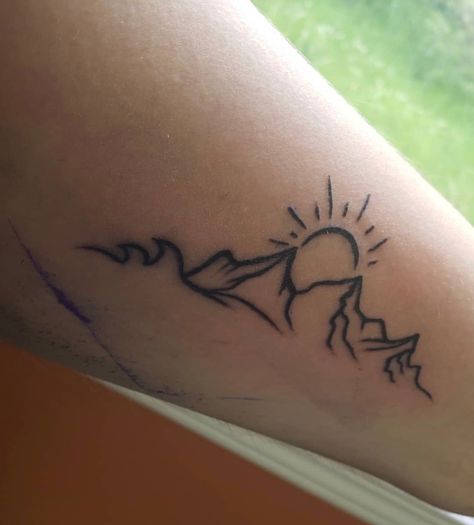 Mountain with sunrise or sunset on forearm Sunrise Arm Tattoo, Mountain And Sunset Tattoo, Mountain Sunrise Tattoo, Sunset Sunrise Tattoo, Mountain Sunset Tattoo, Mountain With Sunrise, Sunrise Tattoos, Cuba Tattoo, Moutain Tattoos