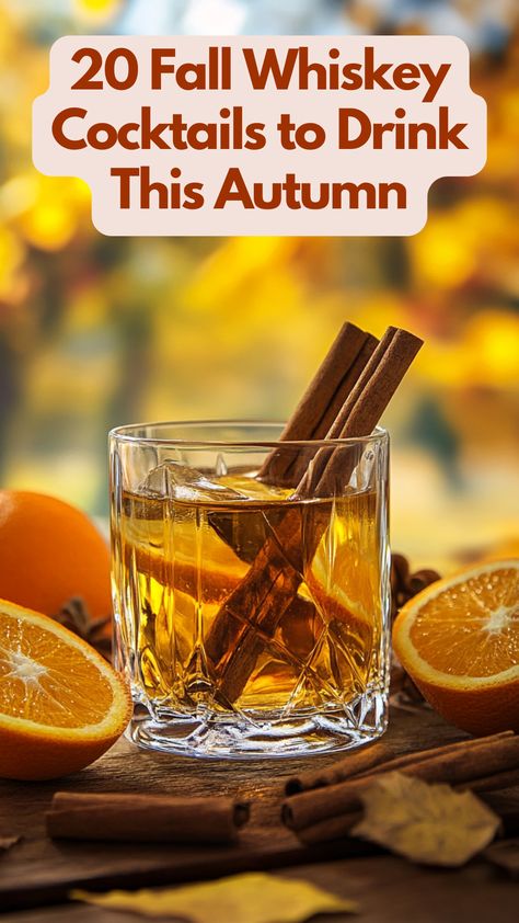 A glass of whiskey cocktail garnished with cinnamon sticks and orange slices, set against a cozy autumn backdrop with warm fall colors. Whiskey Fall Drinks, Thanksgiving Whiskey Drinks, Fall Whiskey Drinks, Wiskey Mix Drink, Fall Bourbon Cocktails, Hot Whiskey Drinks, Fall Whiskey Cocktails, Irish Whiskey Drinks, Whiskey Mixed Drinks